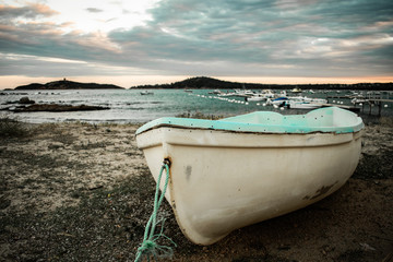Old vintage boat at the shore