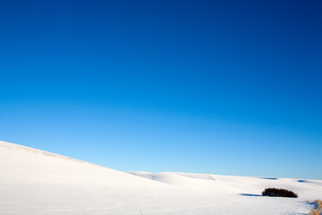 Fototapeta na wymiar landscape with snow and blue sky