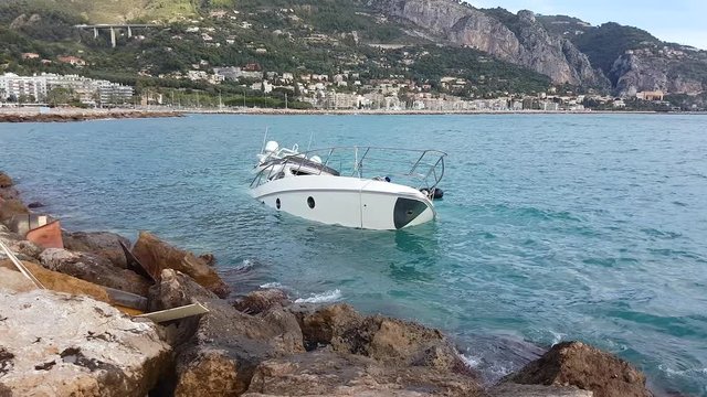 Close Up View Of Luxury Yacht Half Sunken After Storm In The Mediterranean Sea, France, Europe - 4K Resolution
