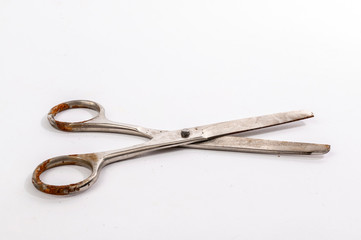 Open rusty steel scissors