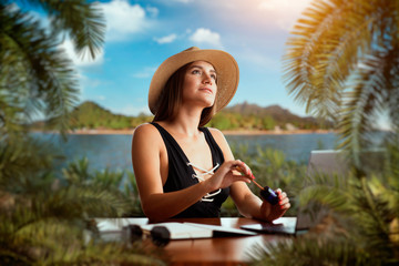 Fototapeta premium Cute woman in swimsuit, dreams about a vacation 