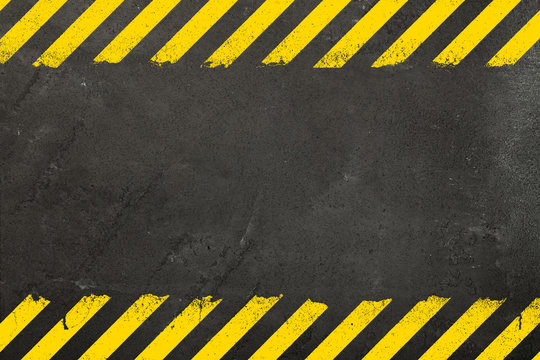 Concrete background with grunge hazard sign