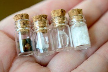 Adorable miniature bottles, fresh herbs and crystal bottles. Apothecary bottle set, cute little crystal vials, witchy decor. Wiccan ritual crystals with fresh flowers. 