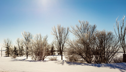 Antique barn in rural Quebec Canada after a snow storm.