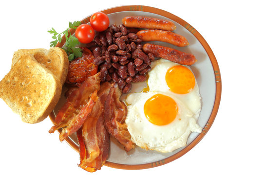 Full English breakfast isolated on white background. Top view


