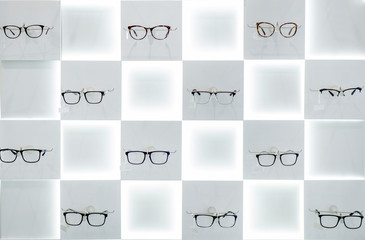 glasses in the shop - obrazy, fototapety, plakaty