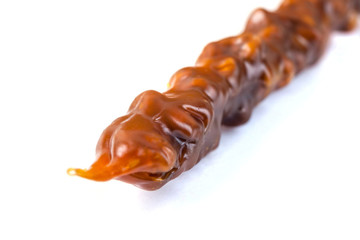 Tasty oriental sweets, churchkhela on  white background. Georgian national dessert