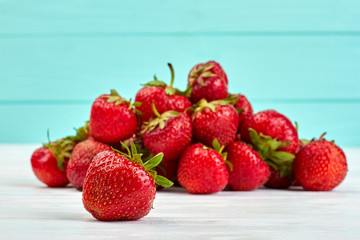 Red fresh strawberry. Heap of fragrant summer berries. Wholesome seasonal fruits.