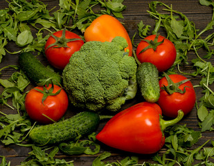 fresh fruits and vegetables on a dark wooden background