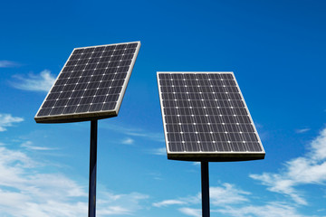 Small solar panels against a blue sky