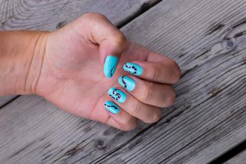 nail art manicure with colorful polish nails. Beauty hand and stylish nails.
