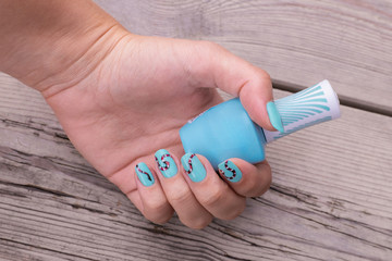 nail art manicure with colorful polish nails. Beauty hand and stylish nails.

