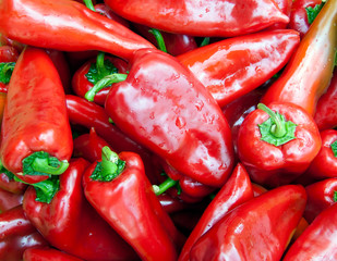 a pile of organic red peppers ready to making ajvar