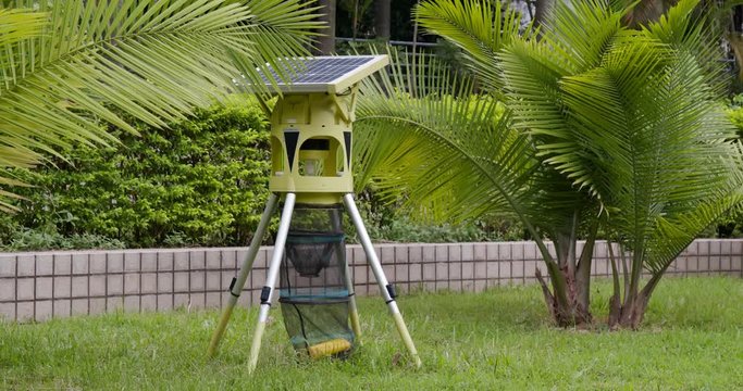 Solar energy mosquito catching machine in park