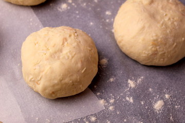 homemade buns close-up with their own hands.