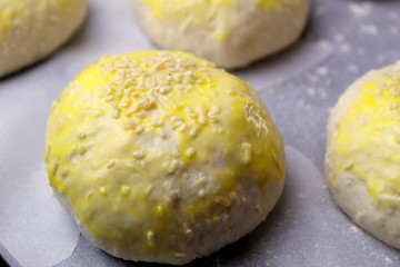homemade buns close-up with their own hands.