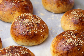 homemade buns close-up with their own hands.