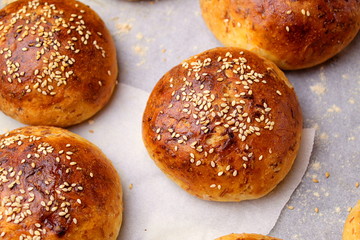 homemade buns close-up with their own hands.