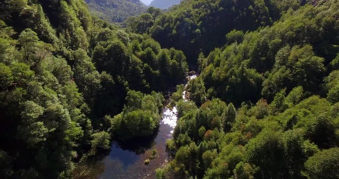Aerial view of the Tagua Tagua park and its diverse geography, with forests, mountains, lagoons and waterfalls