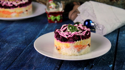 New Year's and Christmas layered salad, selective focus.