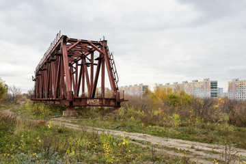Fototapeta na wymiar Abandoned farm railway bridge at the station Pererva in Moscow