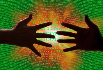 Hands with binary code