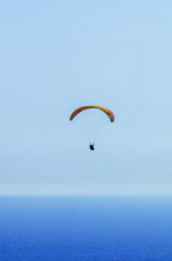Paraglider flying in the sky free time spent actively wonderful experiences vacation
