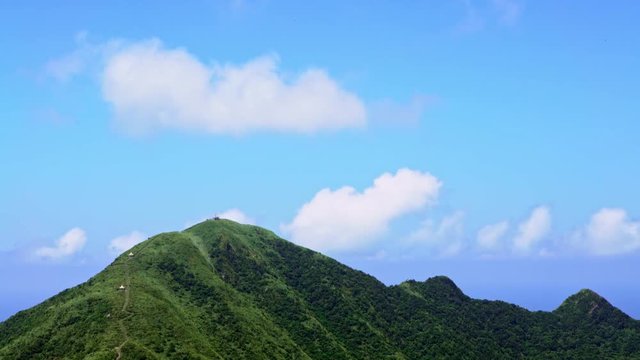 4K, View of Keelung mountain in New Taipei city. Beauty landscape of green mountains with blue sky. Scenic of journey adventure tourismin a beautiful day of summer in Jishan, Ruifang District-Dan