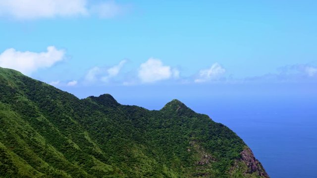 4K, Keelung mountain with blue sky in New Taipei. Beauty landscape of green mountains with long stairs and chinese pavilion. Scenic journey adventure tourismin a beautiful day of summer in Jishan-Dan