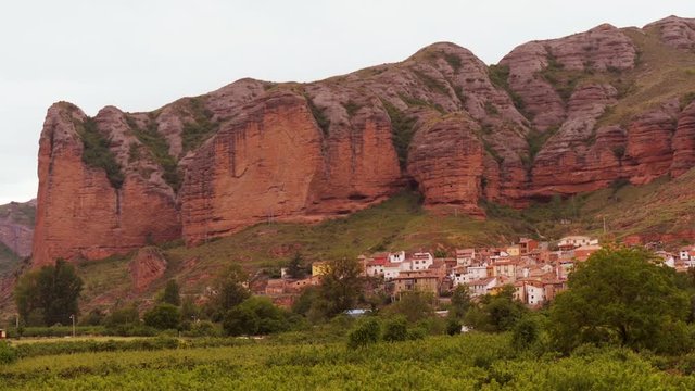 Picturesque Village at the bottom Pe&ntilde;a Bajenza, the Canyon in Islallana, La Rioja, Spain - Gate of La Rioja -wide shot