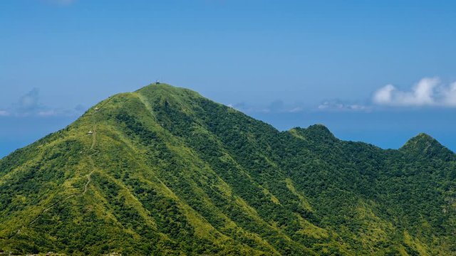 4K, Timelapse of Keelung mountain with blue sky in New Taipei city. Beauty landscape of green mountains with long stairs and chinese pavilion. Scenic in a beautiful day of summer at Jishan-Dan