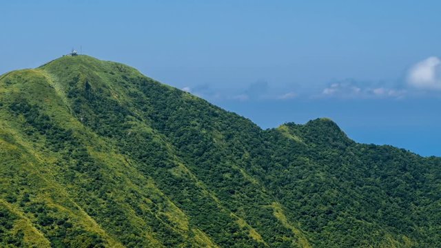 Timelapse of Keelung mountain in New Taipei city. Beauty Hyperlapse of landscape of green mountains with blue sky. Scenic of journey tourism in a beautiful day of summer in Jishan, Ruifang-Dan