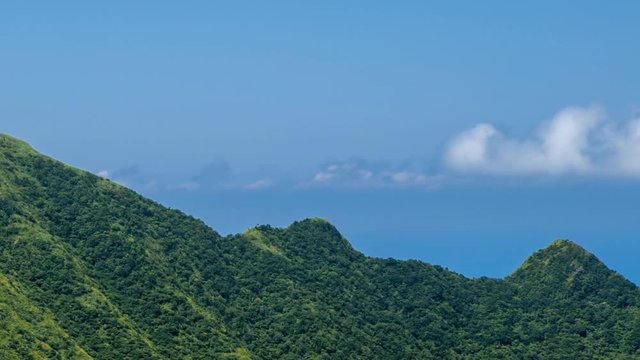 Timelapse of Keelung mountain in New Taipei city. Beauty Hyperlapse of landscape of green mountains with blue sky. Scenic of journey tourism in a beautiful day of summer in Jishan, Ruifang-Dan