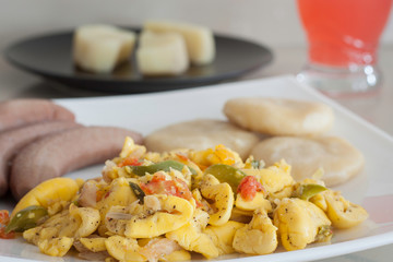 Ackee and Salt Fish served with boiled bananas and dumplings