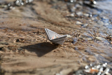 newspaper ship sails