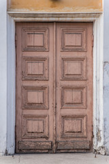 Obraz na płótnie Canvas Old abandoned door without handles