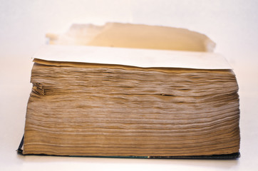 old thick and crumpled book
