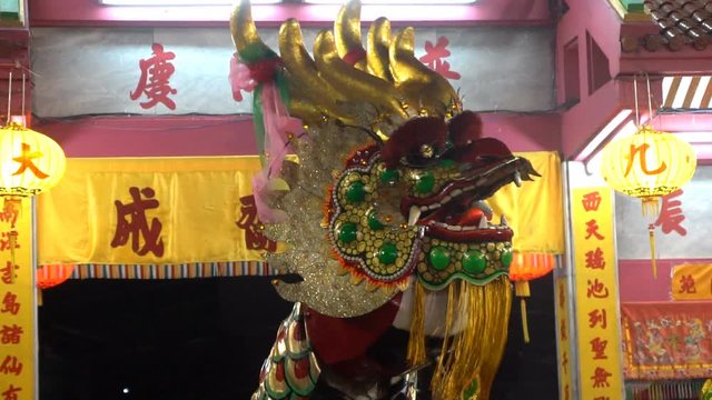 Chinese dragon performing at night.