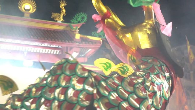Chinese dragon performing at night.