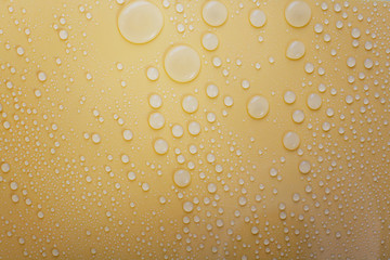 Waterdrop on blue and yellow background