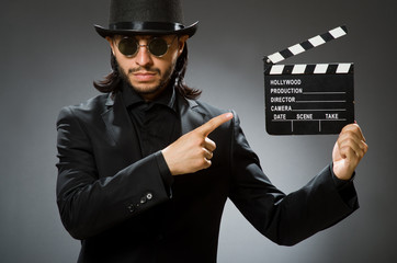 Vintage concept with man wearing black top hat