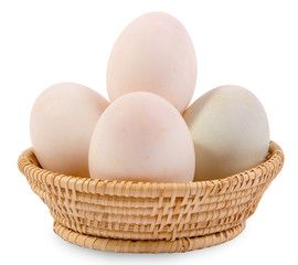 Eggs in the basket Isolated on White Background
