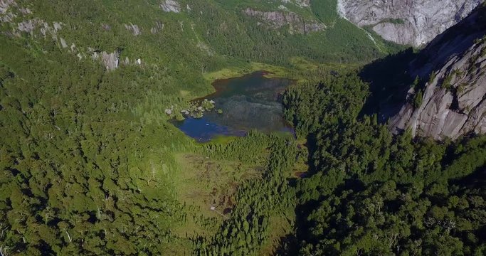 Aerial view of the Tagua Tagua park and its diverse geography, with forests, mountains, lagoons and waterfalls