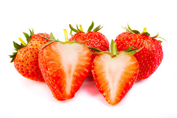Strawberry with sliced half and leaves isolated on white background with clipping path