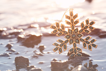 Festive Snowflake At Christmas Sunset On The Beach