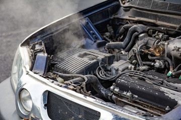 car engine over heat with no water in radiator and cooling system. - obrazy, fototapety, plakaty