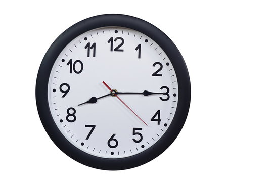 Time concept with black clock at a quarter past eight am or pm