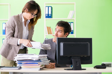 Man employee suffering from excessive work 