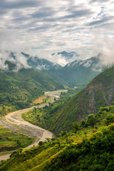 Fototapeta na wymiar River Surrounded by Stepping Fields in Bach Kande, Lamgarha, Almora, Uttarakhand 