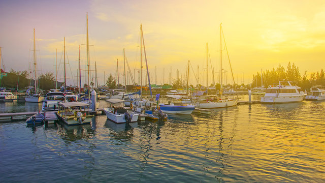 Sunset view of beautiful yatch at harbour.